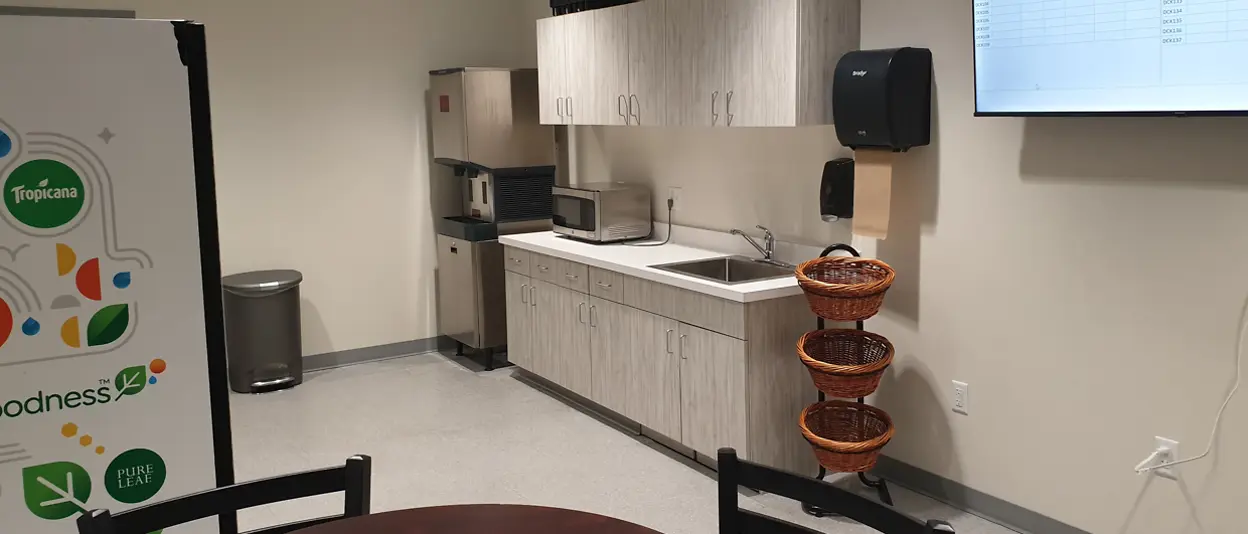 photos of distribution point amenities for truck drivers, including kitchens and showers